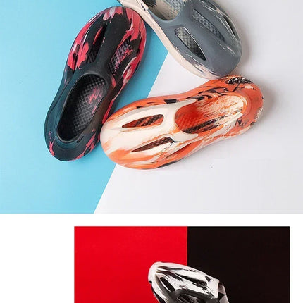 Pantoufles compensées camouflage unisexe Matériau souple EVA Technologie de moulage par injection Chaussures de plage décontractées pour hommes et femmes