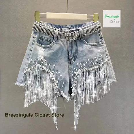 Pantaloncini di jeans con strass pieni dell'industria pesante americana, jeans strappati con nappe sottili e perline, nuovi jeans estivi da donna a vita alta.