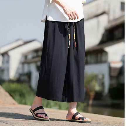 Pantaloncini larghi da uomo Pantaloni casual traspiranti estivi Gamba larga in cotone di lino Taglie forti 5XL Pantaloni Harajuku comodi da esterno da uomo