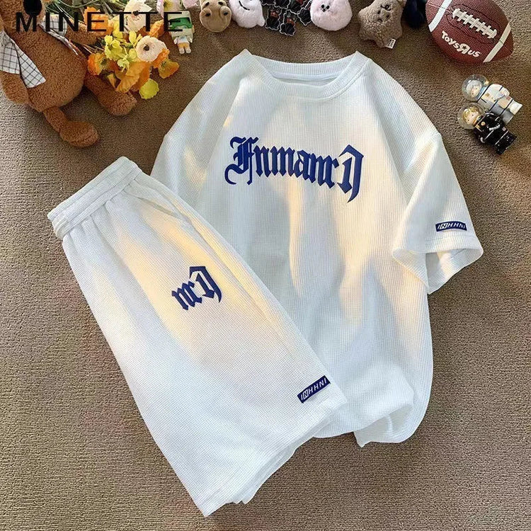 Set di abbigliamento sportivo a maniche corte in seta di ghiaccio estiva casual con waffle transfrontaliero T-shirt da uomo Set di abbigliamento da uomo abbinato platinumshop