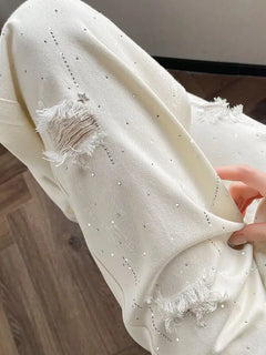 Jeans bianchi traspiranti a gamba larga da donna Pantaloni strappati per pantaloni estivi a vita alta con diamanti