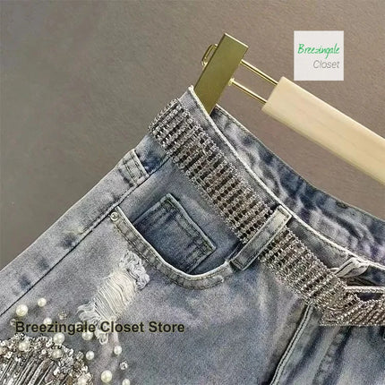 American heavy industry full rhinestone denim shorts, thin tassel beaded ripped jeans, new women's high-waisted summer jeans.
