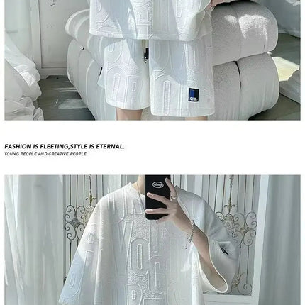 Abito di moda maschile bello set con pantaloncini a maniche corte jacquard sportivi casual larghi Set da due pezzi 2025 Primavera ed estate platinumshop