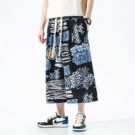 Pantaloncini da uomo estivi Stampa Pantaloni da spiaggia traspiranti a gamba larga Pantaloni larghi casual alla moda Vita elastica Comodi pantaloni al polpaccio da uomo