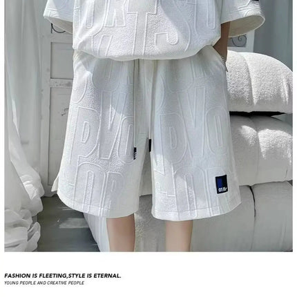 Abito di moda maschile bello set con pantaloncini a maniche corte jacquard sportivi casual larghi Set da due pezzi 2025 Primavera ed estate platinumshop