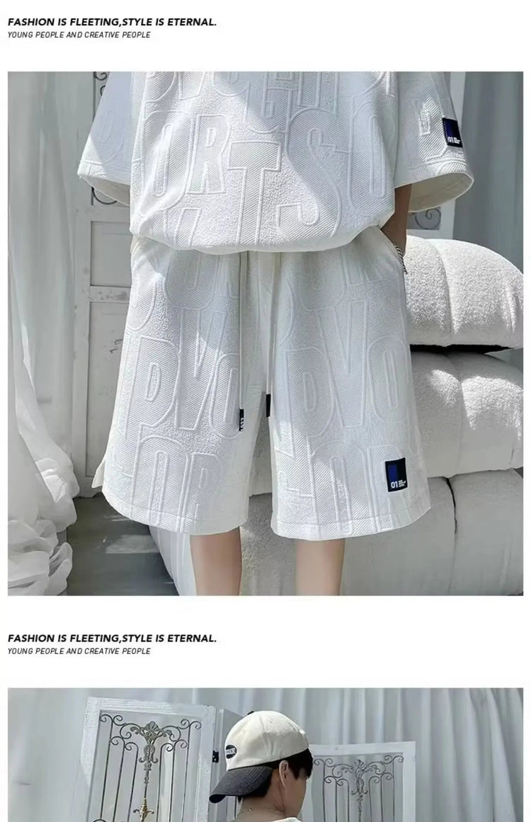 Abito di moda maschile bello set con pantaloncini a maniche corte jacquard sportivi casual larghi Set da due pezzi 2025 Primavera ed estate platinumshop