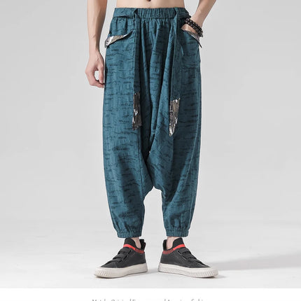 Pantaloni a gamba larga da uomo in cotone e lino casual oversize Harajuku pantaloni alla moda da uomo samurai giapponese retrò Ukiyo-e stampa pantaloni con cintura da uomo