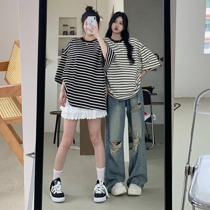Jeans americani retrò traforati da donna a vita alta con cavallo dritto design sottile allentato High-street Vibe pantaloni trascinanti a gamba larga