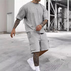 T-shirt alla moda nuovo stile estivo e pantaloncini multiuso Set in tinta unita, un abito da uomo casual e sportivo