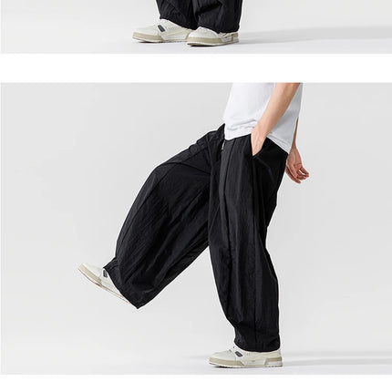 Pantaloni Uomo Nuova Estate Pantaloni larghi leggeri e sottili in vita elastica Sport all'aria aperta maschili Pantaloni larghi casual oversize da uomo Streetwear