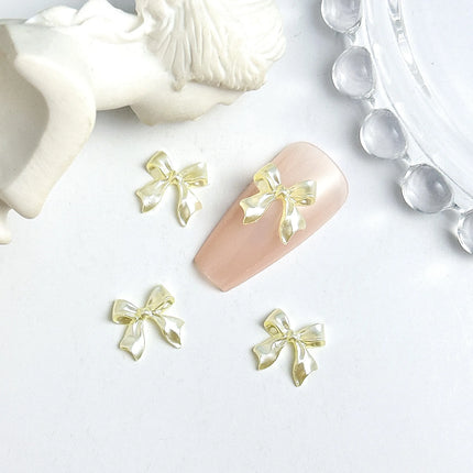 50pcs 3D Sweet Pearly Glossy Ribbon Bow Resin Nail Charms Ballerina Bow Tie Nail Art Decoration Nail Accessories Manicure DIY