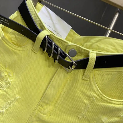 New style ripped denim shorts with frayed washed pockets and wide legs