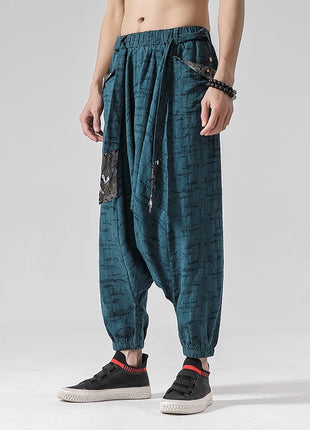Pantaloni a gamba larga da uomo in cotone e lino casual oversize Harajuku pantaloni alla moda da uomo samurai giapponese retrò Ukiyo-e stampa pantaloni con cintura da uomo
