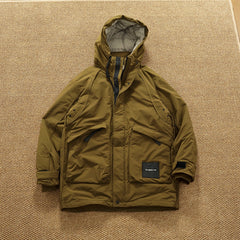 Piumino cargo imbottito in piuma d'anatra di media lunghezza retrò americano nuovo inverno con cappuccio Trench oversize spesso alla moda da uomo