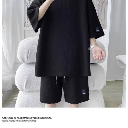 Abito di moda maschile bello set con pantaloncini a maniche corte jacquard sportivi casual larghi Set da due pezzi 2025 Primavera ed estate platinumshop