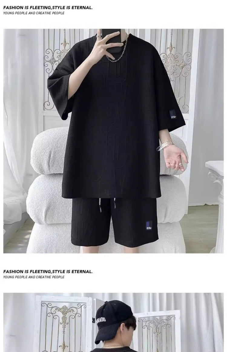 Abito di moda maschile bello set con pantaloncini a maniche corte jacquard sportivi casual larghi Set da due pezzi 2025 Primavera ed estate platinumshop
