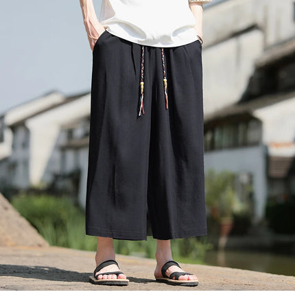 Pantaloncini larghi da uomo Pantaloni casual traspiranti estivi Gamba larga in cotone di lino Taglie forti 5XL Pantaloni Harajuku comodi da esterno da uomo