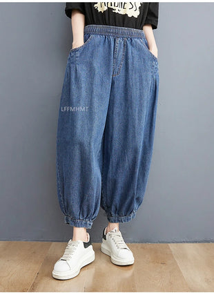 Jeans Vintage tinta unita da donna moda estiva pantaloni larghi in Denim elasticizzato in vita femminile pantaloni Harem alla caviglia stile giapponese