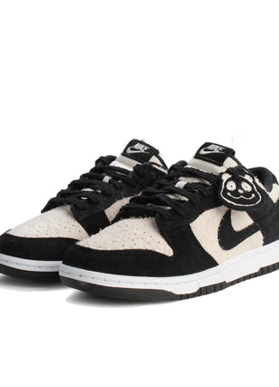 Scarpe da skateboard Nike Dunk da uomo bianche nere IB2990-100