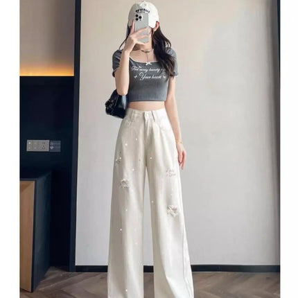 Jeans bianchi traspiranti a gamba larga da donna Pantaloni strappati per pantaloni estivi a vita alta con diamanti