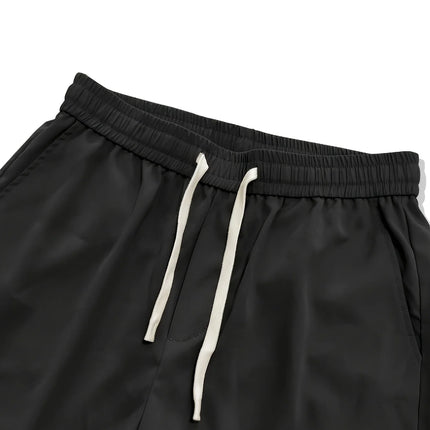 Pantaloncini da uomo casual classici a tinta unita di media lunghezza, semplici pantaloncini sportivi casual di tendenza