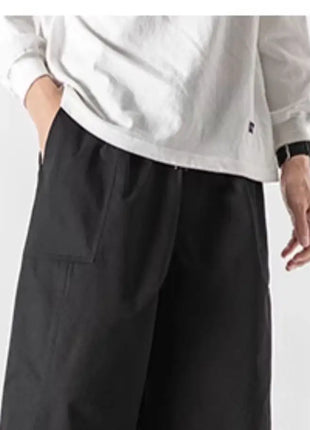 Pantaloni estivi da uomo a gamba larga Pantaloni moda casual solidi leggeri e sottili Harun Pantaloni da jogging larghi da uomo Pantaloni cargo Streetwear Taglie forti 5XL