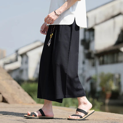 Pantaloncini larghi da uomo Pantaloni casual traspiranti estivi Gamba larga in cotone di lino Taglie forti 5XL Pantaloni Harajuku comodi da esterno da uomo