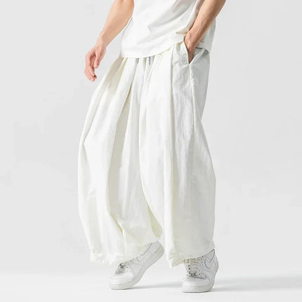 Pantaloni cargo da uomo Pantaloni casual stile giapponese Harajuku Moda allentata maschile Harem Pantaloni a gamba larga in vita elastica Uomo Nuovo streetwear