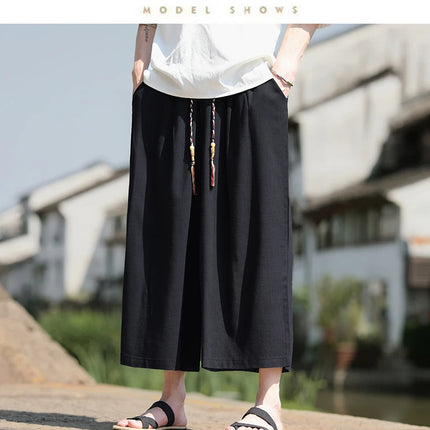 Pantaloncini larghi da uomo Pantaloni casual traspiranti estivi Gamba larga in cotone di lino Taglie forti 5XL Pantaloni Harajuku comodi da esterno da uomo