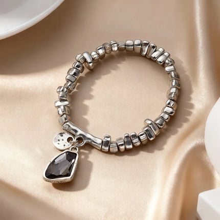 Set di bracciali con collana con pendente in cristallo grigio irregolare semplice barocco Set di gioielli con perline color argento estetico delicato per donna uomo platinumshop