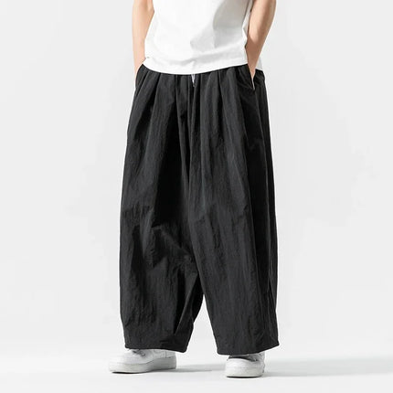 Pantaloni cargo da uomo Pantaloni casual stile giapponese Harajuku Moda allentata maschile Harem Pantaloni a gamba larga in vita elastica Uomo Nuovo streetwear