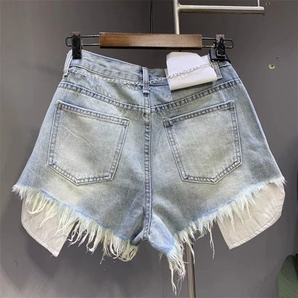 New style ripped denim shorts with frayed washed pockets and wide legs