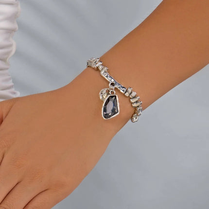Set di bracciali con collana con pendente in cristallo grigio irregolare semplice barocco Set di gioielli con perline color argento estetico delicato per donna uomo platinumshop