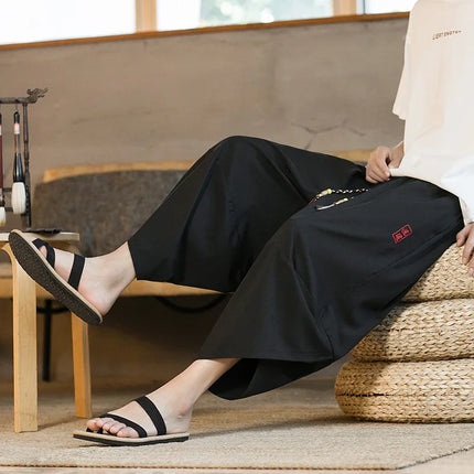 Pantaloncini da samurai giapponesi Kimono estivo da uomo Pantaloni da bagno tradizionali Abbigliamento asiatico da uomo allentato casual Pantaloni a gamba larga Yukata neri