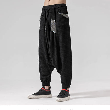 Pantaloni a gamba larga da uomo in cotone e lino casual oversize Harajuku pantaloni alla moda da uomo samurai giapponese retrò Ukiyo-e stampa pantaloni con cintura da uomo