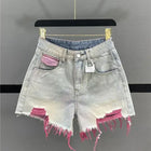 Pantaloncini di jeans con foro rosa stile coreano Donna Estate Nuova vita alta Bordo grezzo A-line Pantaloncini per ragazze calde Pantaloni caldi sottili di nicchia di moda