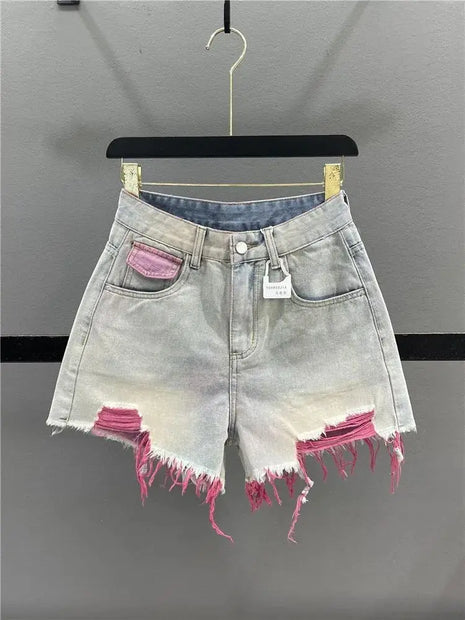 Pantaloncini di jeans con foro rosa stile coreano Donna Estate Nuova vita alta Bordo grezzo A-line Pantaloncini per ragazze calde Pantaloni caldi sottili di nicchia di moda