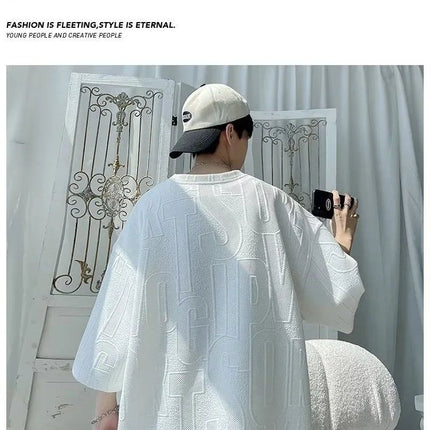Abito di moda maschile bello set con pantaloncini a maniche corte jacquard sportivi casual larghi Set da due pezzi 2025 Primavera ed estate platinumshop