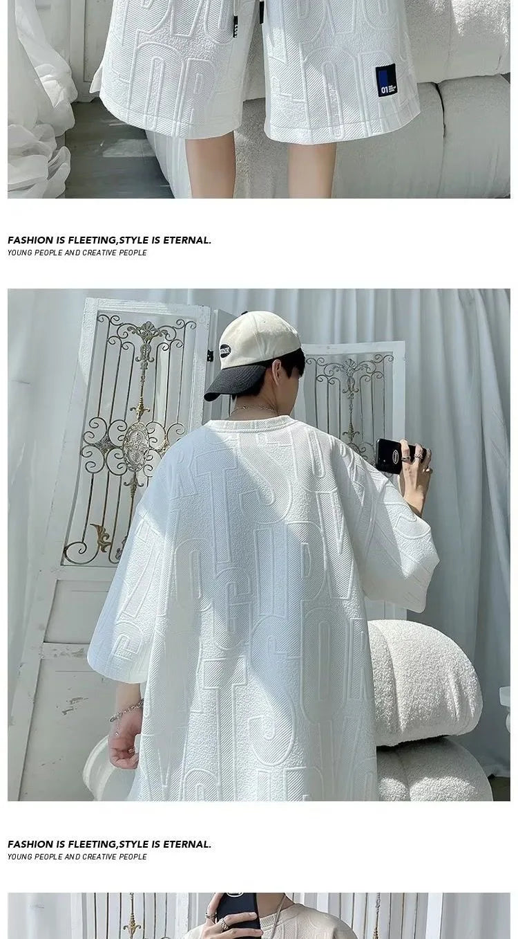 Abito di moda maschile bello set con pantaloncini a maniche corte jacquard sportivi casual larghi Set da due pezzi 2025 Primavera ed estate platinumshop