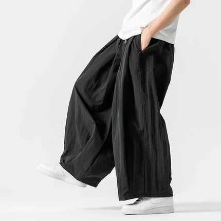Pantaloni cargo da uomo Pantaloni casual stile giapponese Harajuku Moda allentata maschile Harem Pantaloni a gamba larga in vita elastica Uomo Nuovo streetwear