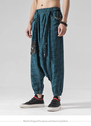 Pantaloni a gamba larga da uomo in cotone e lino casual oversize Harajuku pantaloni alla moda da uomo samurai giapponese retrò Ukiyo-e stampa pantaloni con cintura da uomo