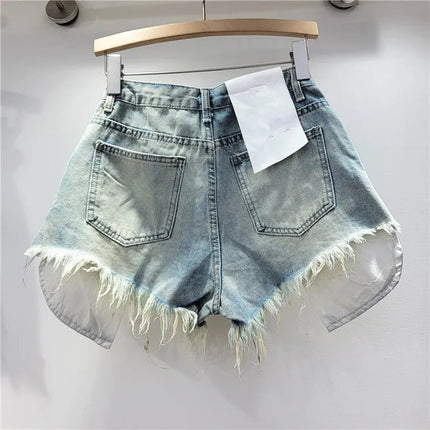 Pantaloncini di jeans con foro rosa delle nuove donne estive 2026 a vita alta che dimagriscono pantaloncini con bordo sfilacciato a trapezio per ragazza piccante - platinumshop