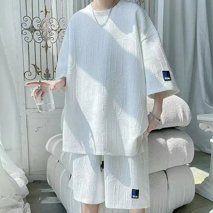 Abito di moda maschile bello set con pantaloncini a maniche corte jacquard sportivi casual larghi Set da due pezzi 2025 Primavera ed estate platinumshop