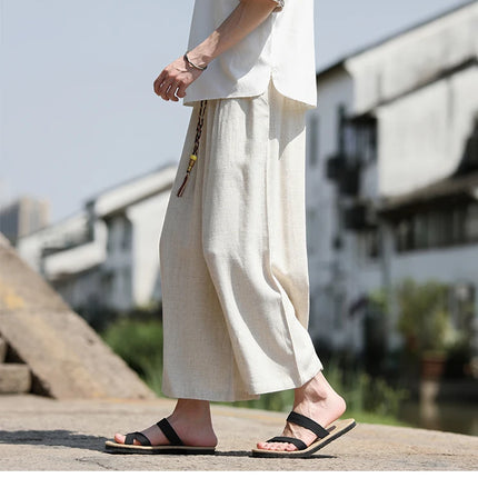 Pantaloncini larghi da uomo Pantaloni casual traspiranti estivi Gamba larga in cotone di lino Taglie forti 5XL Pantaloni Harajuku comodi da esterno da uomo