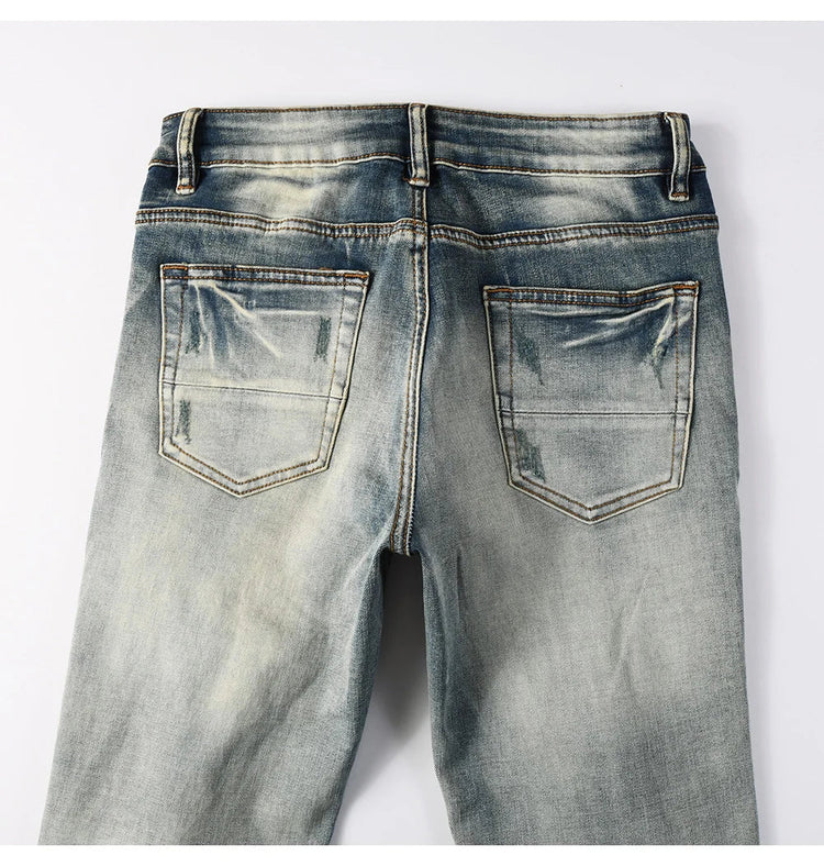 Men Pale Light Blue Biker Jeans Cracked Pleated Patch Patchwork Stretch Denim Pants Streetwear Holes Ripped Skinny Trousers PlatiNum