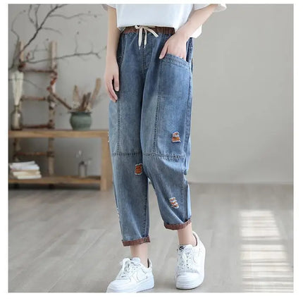 Jeans Strappati a Nove Punti da Donna, Nuovi Pantaloni Harem Casual Sottili con Vita Elastica, Lunghi alla Caviglia, in Denim, per l'Estate 2026