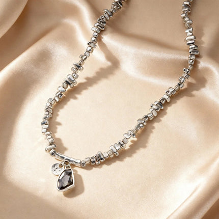 Set di bracciali con collana con pendente in cristallo grigio irregolare semplice barocco Set di gioielli con perline color argento estetico delicato per donna uomo platinumshop