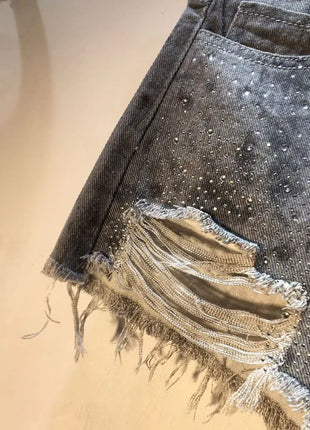 2025 Abiti estivi, Nuovi pantaloncini di jeans con bordo ruvido indossato a vita alta con perforazio