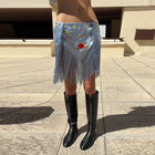 Minigonna Chic da Donna con Ricami e Frange, Modello Irregolare a Fiori, Collezione Estate 2026, per Vacanze e Streetwear