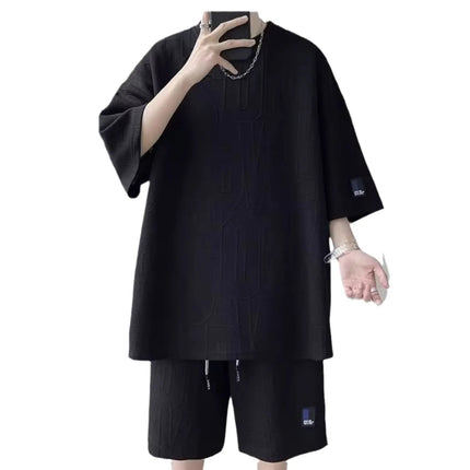 Abito di moda maschile bello set con pantaloncini a maniche corte jacquard sportivi casual larghi Set da due pezzi 2025 Primavera ed estate platinumshop